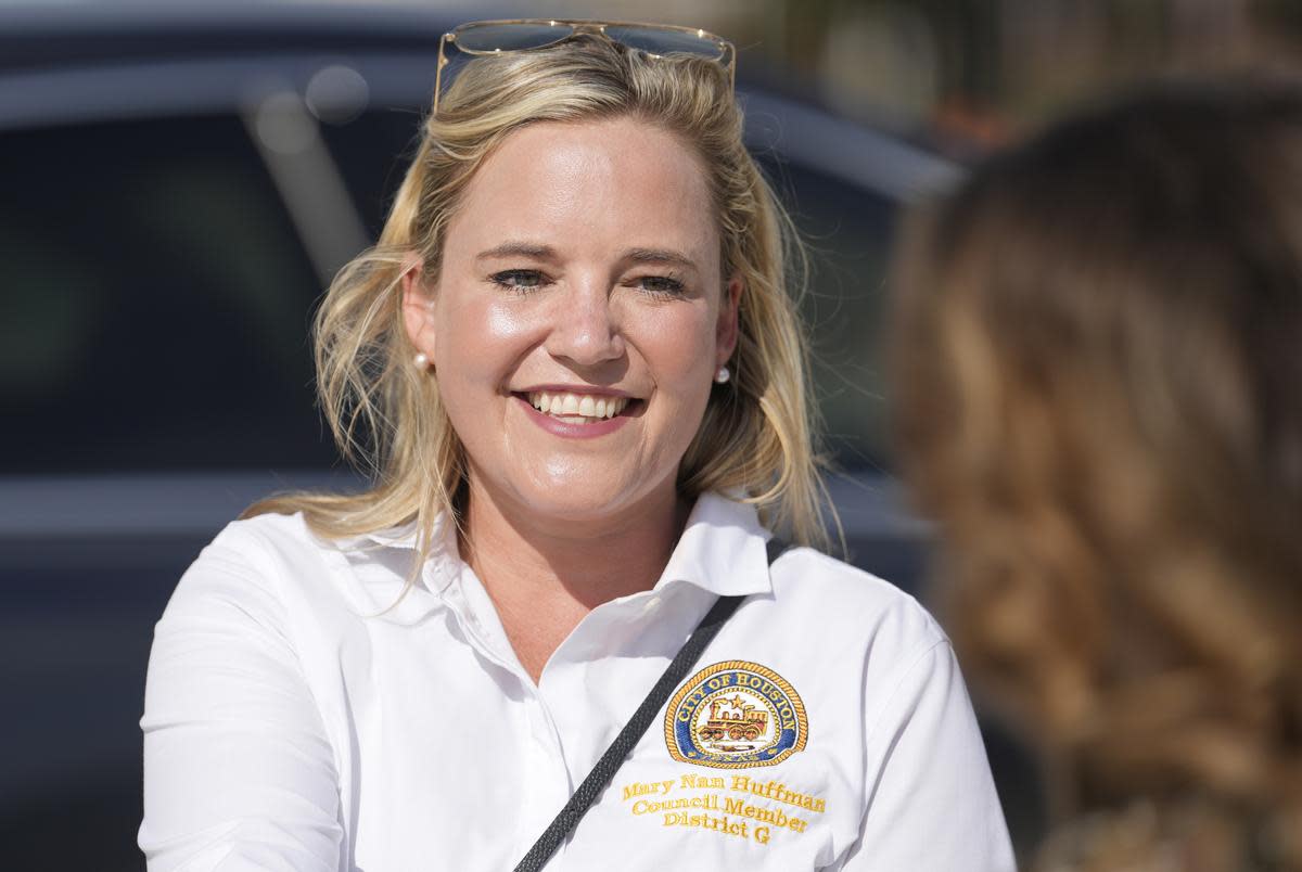 Mary Nan Huffman, candidate for Houston City Council District G, talks with people at Nottingham Elementary School, 570 Nottingham Oaks Trail, on Election Day Tuesday, Nov. 7, 2023, in Houston.