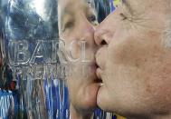 Britain Soccer Football - Leicester City v Everton - Barclays Premier League - King Power Stadium - 7/5/16 Leicester City manager Claudio Ranieri with the trophy as he celebrates winning the Barclays Premier League Action Images via Reuters / Carl Recine Livepic