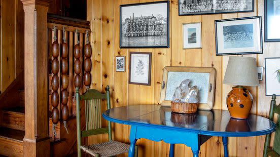 treasured island cedar shake cottages bailey island, maine home of carter smith table and chairs, breakfast nook, black and white class photographs