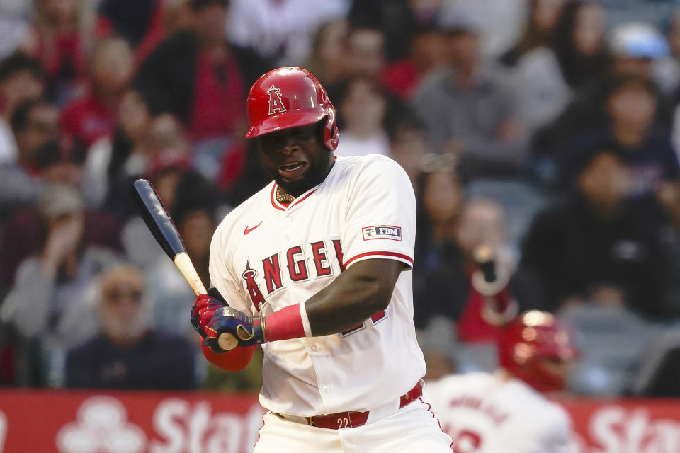 Los Angeles Angels' Miguel Sano reacts to a wild pitch during the third inning of a baseball game against the Baltimore Orioles, Tuesday, April 23, 2024, in Anaheim, Calif. (AP Photo/Ryan Sun)
