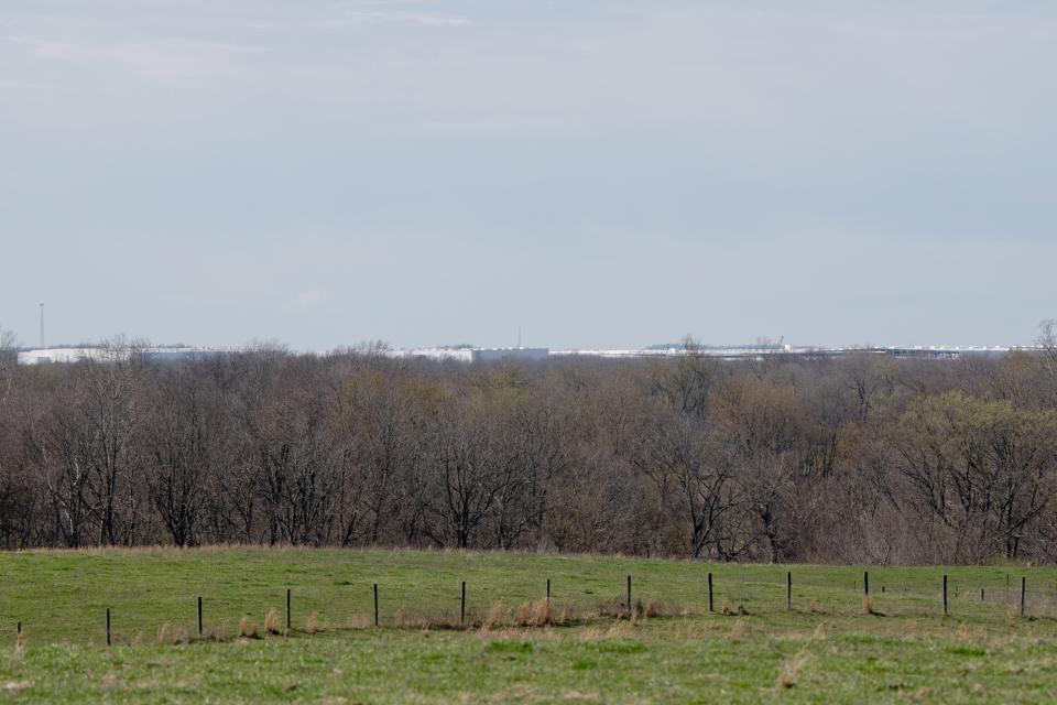 The BlueOval SK Battery Park in Glendale can be seen from Ryan Bivens’ farm in LaRue County. The development has led nearby residents to sell their land for the park's expansion.