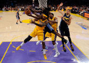 LOS ANGELES, CA - MAY 12: Jordan Hill #27 of the Los Angeles Lakers and Kenneth Faried #35 of the Denver Nuggets battle for a rebound under the basket in the first half in Game Seven of the Western Conference Quarterfinals in the 2012 NBA Playoffs on May 12, 2012 at Staples Center in Los Angeles, California. NOTE TO USER: User expressly acknowledges and agrees that, by downloading and or using this photograph, User is consenting to the terms and conditions of the Getty Images License Agreement. (Photo by Kevork Djansezian/Getty Images)