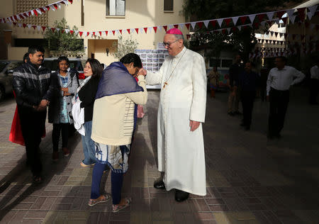 Apostolic Vicar of Northern Arabia, Bishop Camillo Ballin greets worshippers after Friday morning mass at Sacred Heart Catholic Church, as Catholics are awaiting a historical visit by Pope Francis to United Arab Emirates, in Manama, Bahrain January 25, 2019. REUTERS/ Hamad I Mohammed