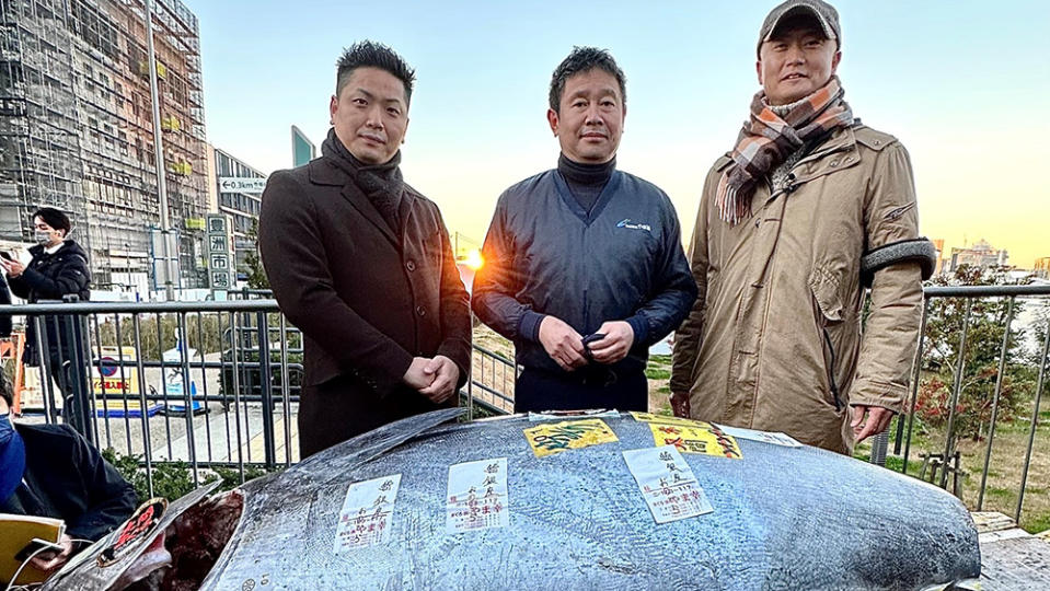 Hiroshi Onodera and his team with the tuna