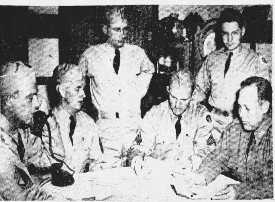 Dec. 8, 1941: Headquarters staff, left to right, Sgt. W.E. McClaren, Sgt. D.G. McKenzie, Cpl. H.T. Ethridge, Sgt. H.L. Matthews, Lt. J.N. Kahn and Captain Johnson.