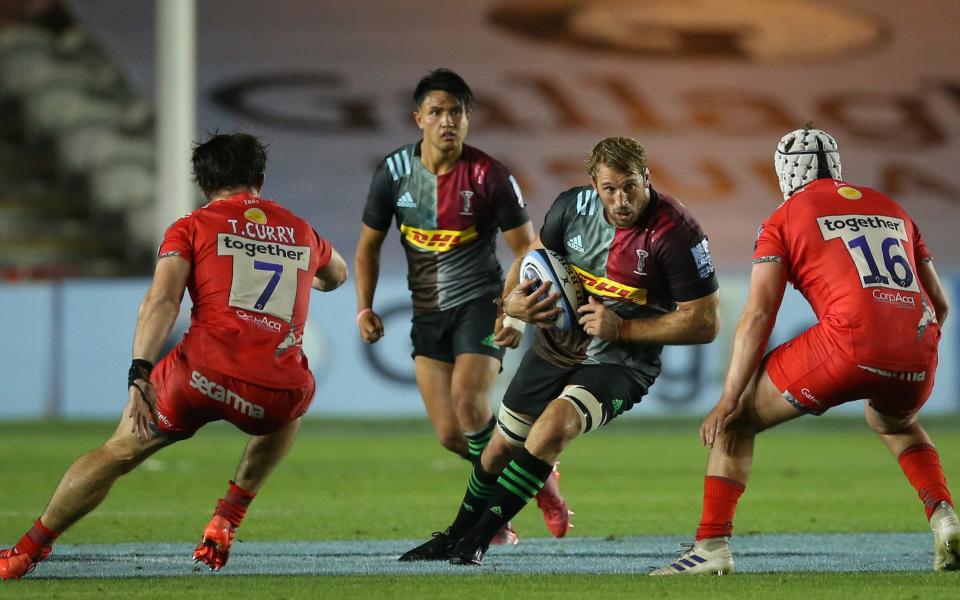 Chris Robshaw of Harlequins takes on Curtis Langdon of Sale Sharks during the Gallagher Premiership Rugby match between Harlequins and Sale Sharks at Twickenham Stoop on August 14, 2020 - Steve Bardens/Getty Images for Harlequins