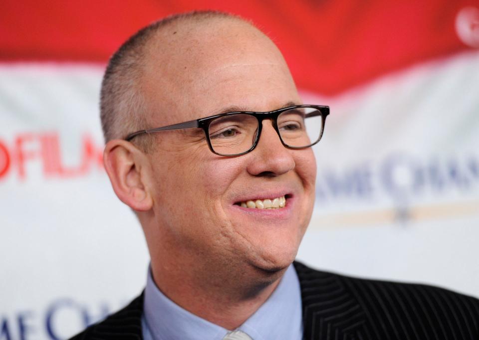 John Heilemann called Russell Brand's comparison of MSNBC and Fox News "false equivalency."