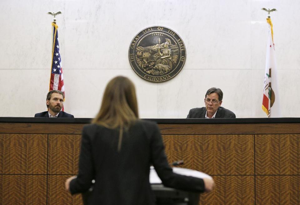 In this photo taken Monday, March 13, 2017, student Michelle Freeman, center, practices her argument in a moot courtroom at the University of California, Hastings College of the Law in San Francisco. Listening on the bench at left is Stephen Tollafield and at right is Gary Watt. The students will have the opportunity to argue at the 9th Circuit, the nation's largest federal appeals court, under an unusual program that offers law schools the opportunity to take on appeals. Over the course of a year, students spend countless hours researching their cases and writing briefs. The experience culminates in a 15-minute presentation before a judicial panel. (AP Photo/Eric Risberg)