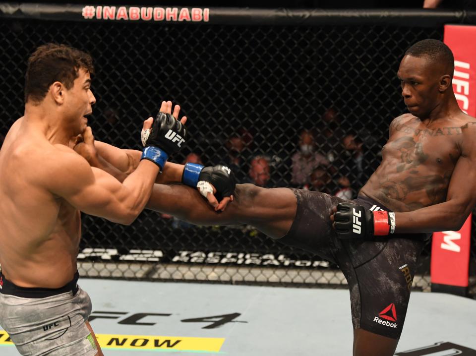 Israel Adesanya (right) put on a masterclass against challenger Paulo Costa (Zuffa/LLC via Getty Images)