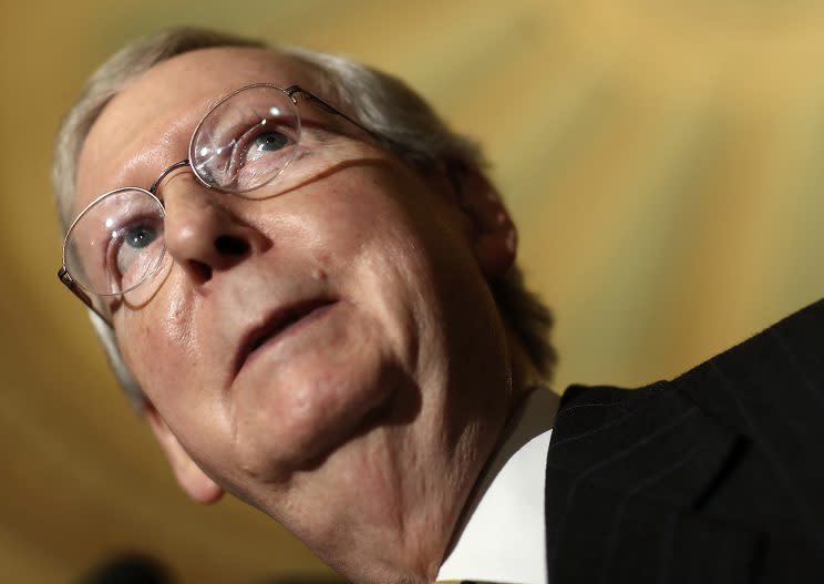 Senate Majority Leader Mitch McConnell (left) (R-Ky.) answers questions from reporters following the Republican caucus policy luncheon at the U.S. Capitol April 25, 2017. (Photo: Win McNamee/Getty Images)