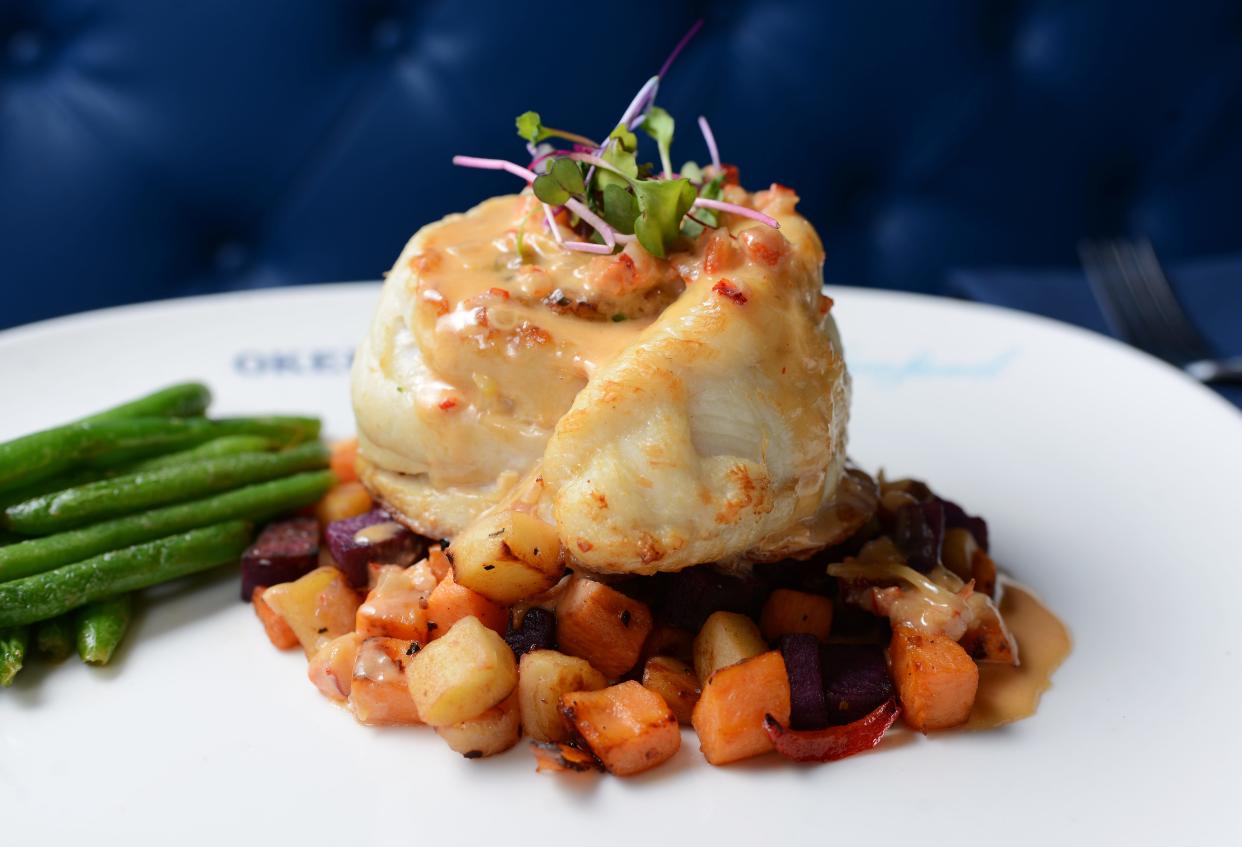 On the menu at Okeechobee Prime Seafood: lobster and crab-stuffed flounder with lobster cream and sweet potato hash.
