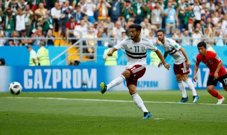 Soccer Football - World Cup - Group F - South Korea vs Mexico - Rostov Arena, Rostov-on-Don, Russia - June 23, 2018 Mexico's Carlos Vela scores their first goal from a penalty REUTERS/Jason Cairnduff