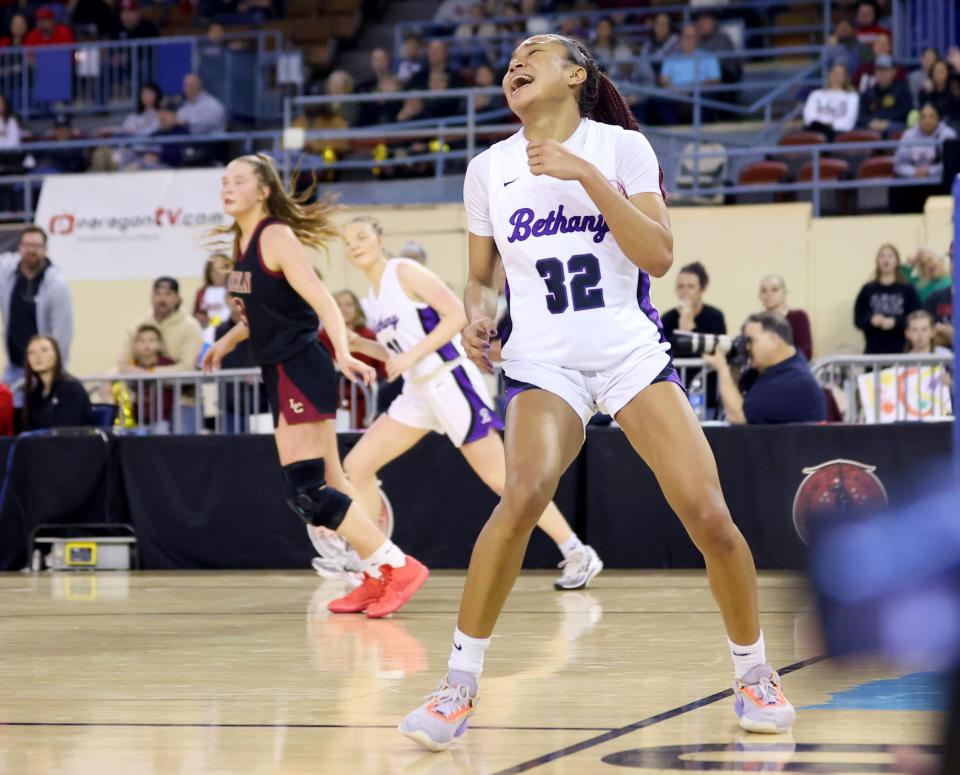 Bethany's Keziah Lofton (32) celebrates a basket during the class 4A girls state championship basketball game between Bethany and Lincoln Christian at the State Fair Arena in Oklahoma City, Saturday, March 9, 2024.