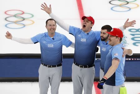 Curling - Pyeongchang 2018 Winter Olympics - Men's Final - Sweden v U.S. - Gangneung Curling Center - Gangneung, South Korea - February 24, 2018 - Vice-skip Tyler George of the U.S. and his teammates, skip John Shuster., lead John Landsteiner and second Matt Hamilton celebrate after winning the match. REUTERS/Cathal McNaughton