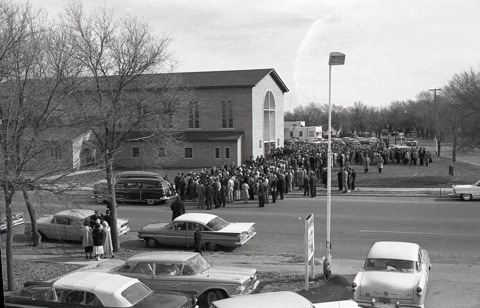 Crowds outside church during the Clutter family funeral. (Photo: SundanceTV/RadicalMedia)