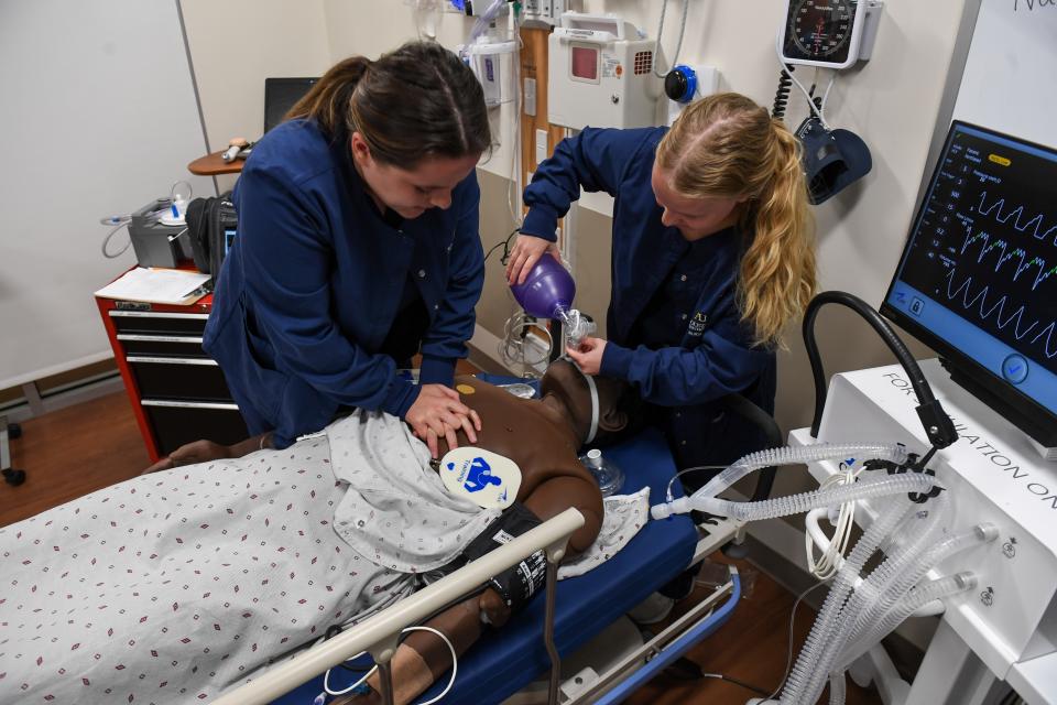 Senior nursing students Erika Hoff and Claire Fischer practice reviving a mannequin patient on Thursday, Nov. 2, 2023 at Augustana University in Sioux Falls, South Dakota.