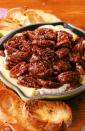 <p>The caramelized topping is EVERYTHING. </p><p>Get the recipe from <a href="https://www.delish.com/holiday-recipes/thanksgiving/a24851390/pecan-pie-brie-recipe/" rel="nofollow noopener" target="_blank" data-ylk="slk:Delish;elm:context_link;itc:0;sec:content-canvas" class="link ">Delish</a>. </p>