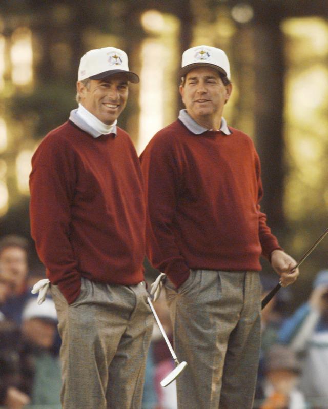 FILE - U.S. players Curtis Strange, left, and Jay Haas prepare to begin Ryder Cup play at Oak Hills Country Club in Rochester, N.Y. Saturday, Sept. 23, 1995. Strange, who wound up losing a pivotal singles match in a European victory, is at the PGA Championship on May 18-21, 2023, with ESPN. It's his first time back to Oak Hill since the Ryder Cup. (AP Photo/Mark Lennihan)