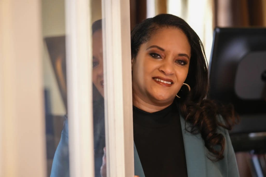 Ashley K. Shelton, executive director of Power Coalition for Equity & Justice in Louisiana, a voter advocacy organization that is trying to get left-leaning voters engaged for next year’s elections, poses for a photo at her family home in Baton Rouge, La., Tuesday, Dec. 26, 2023. (AP Photo/Gerald Herbert)