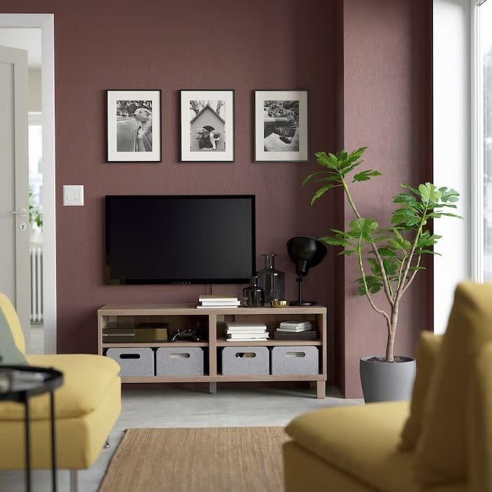 <p><a href="https://www.ikea.com/us/en/p/besta-tv-unit-walnut-effect-light-gray-s89061226/" rel="nofollow noopener" target="_blank" data-ylk="slk:Shop Now;elm:context_link;itc:0;sec:content-canvas" class="link rapid-noclick-resp">Shop Now</a></p><p>Bestå TV Stand</p><p>ikea.com</p><p>$140.00</p>