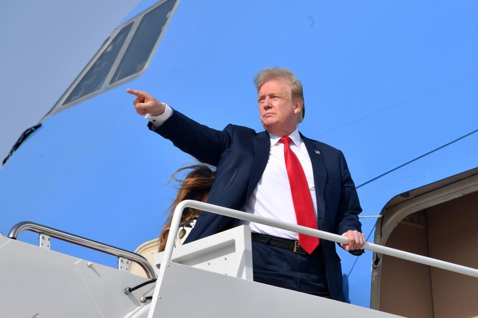 President Donald Trump and First Lady Melania Trump board Air Force One on April 18, 2019, in Maryland.