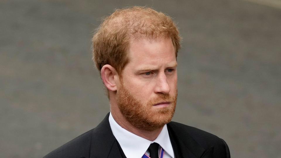 Prince Harry looking sombre in a black suit ahead of the Queen's state funeral