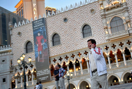 A man walks by in front of The Venetian resort in Las Vegas, Nevada, U.S., August 25, 2016. REUTERS/David Becker