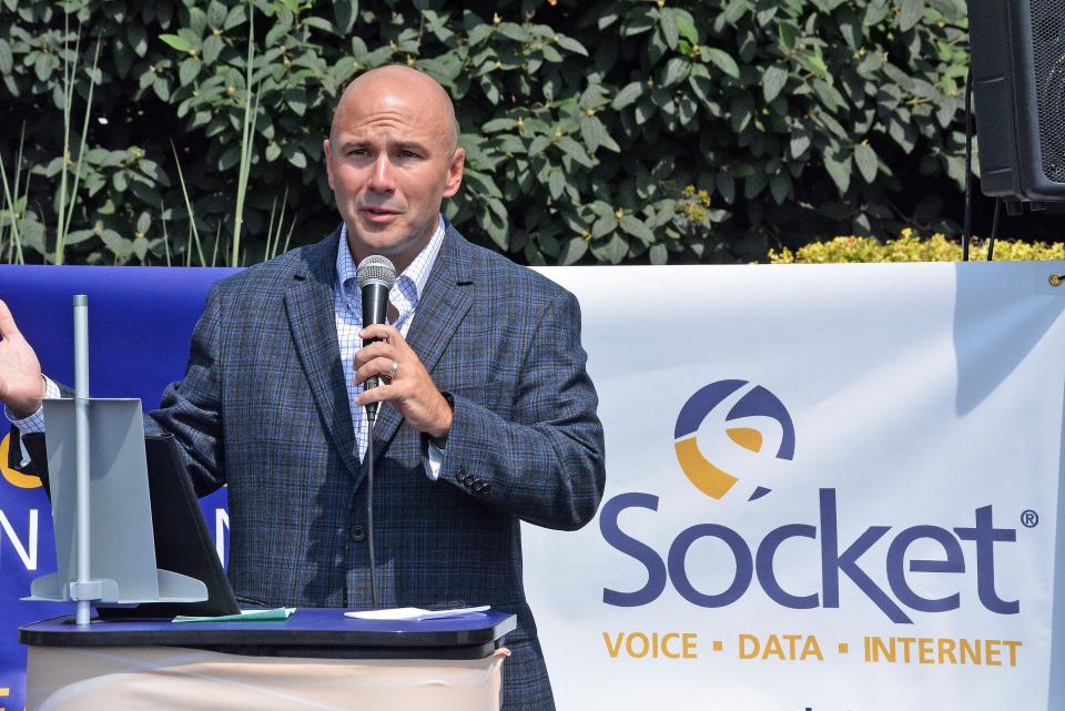 BJ Tanksley, director of the Office of Broadband development in the Missouri Department of Economic Development, speaks Tuesday at a ribbon-cutting for Socket Telecom's expansion of its fiber optic network into western Boone County.