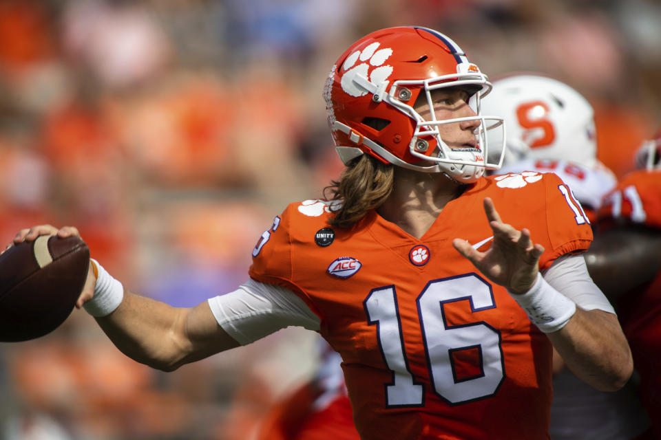 Clemson quarterback Trevor Lawrence (16) makes a pass during an NCAA college football game against Syracuse in Clemson, S.C., on Saturday, Oct. 24, 2020. (Ken Ruinard/Pool Photo via AP)