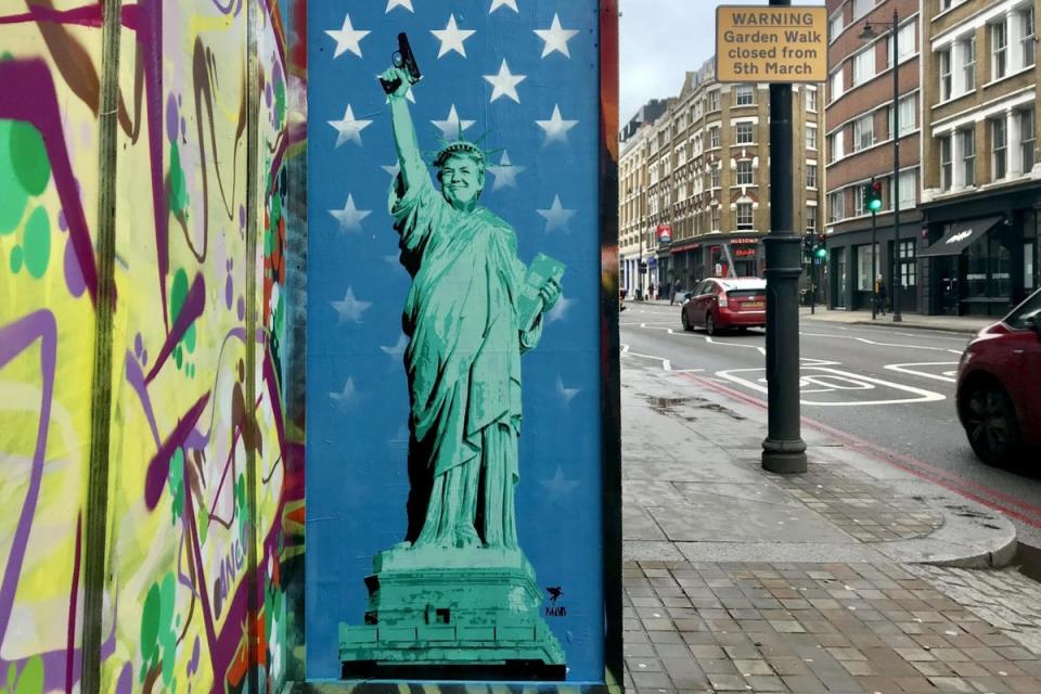 Donald Trump Statue of Liberty Gun Violence street art by Pegasus (@pegasusart)