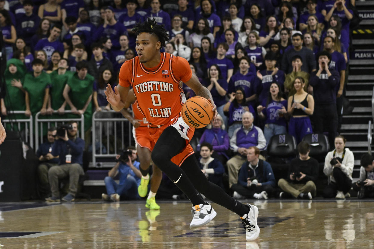 Jan 24, 2024; Evanston, Illinois, USA;  Illinois Fighting Illini guard Terrence Shannon Jr. (0) dribbles the ball against Northwestern Wildcats during the first half at Welsh-Ryan Arena. Mandatory Credit: Matt Marton-USA TODAY Sports