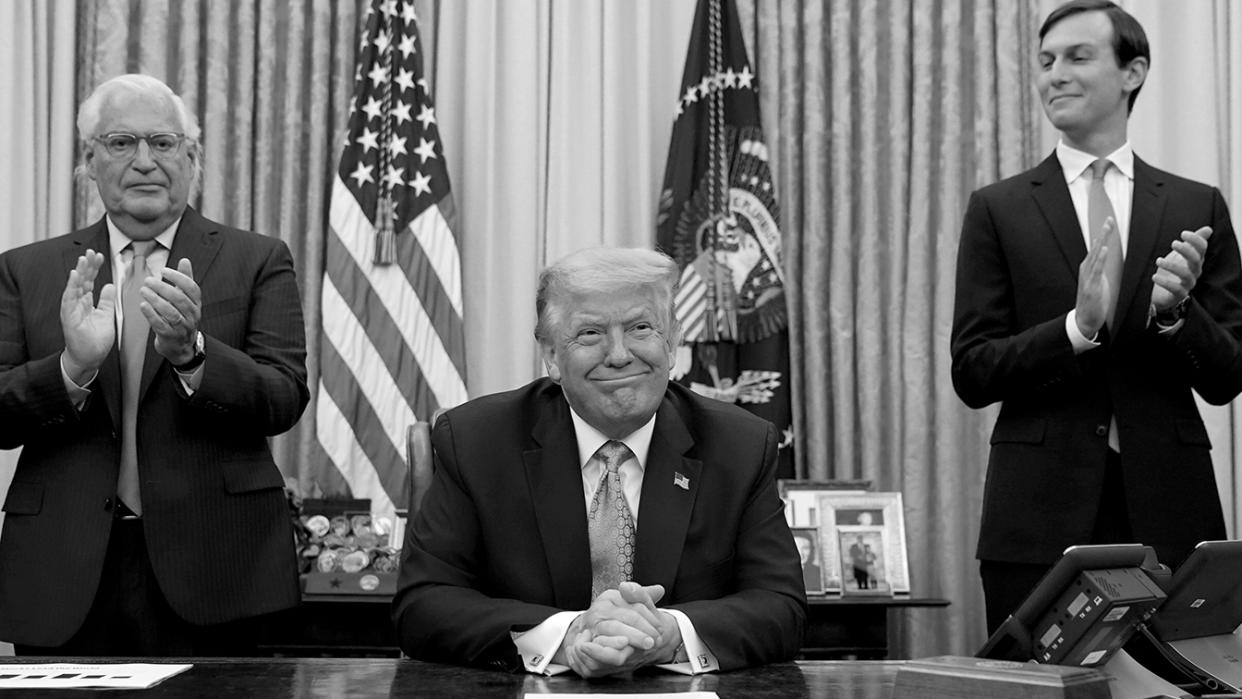 U.S. Ambassador to Israel David Melech Friedman and White House senior adviser Jared Kushner applaud after U.S. President Donald Trump announced a peace deal between Israel and the United Arab Emirates from the Oval Office of the White House in Washington, U.S., August 13, 2020. (Kevin Lamarque/Reuters)