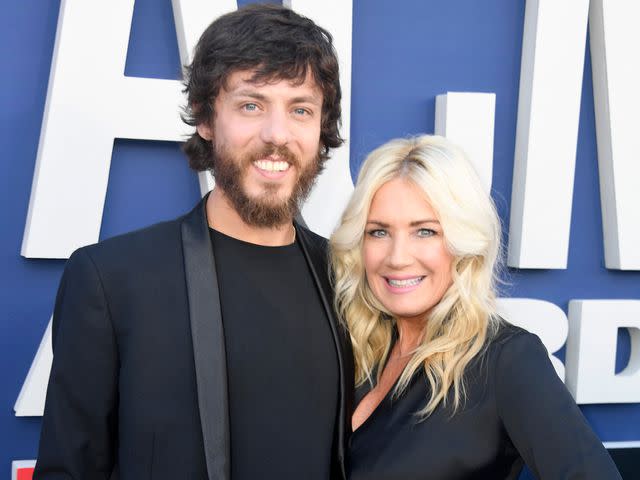 <p>Frazer Harrison/ACMA2019/Getty</p> Chris Janson and Kelly Lynn attend the 54th Academy Of Country Music Awards on April 07, 2019 in Las Vegas, Nevada.