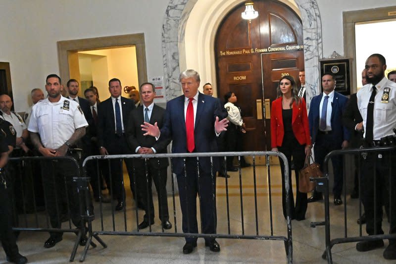 Former President Donald Trump arrives for day two of his civil fraud trial at State Supreme Court. The New York judge, presiding over the case, issued a gag order Tuesday after Trump posted about his law clerk in a social media post. Photo by Louis Lanzano/UPI