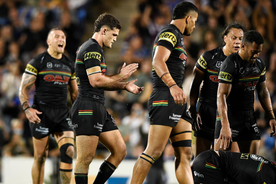 The Panthers players celebrate during the NRL Semifinal match between the Penrith Panthers and the Parramatta Eels at BB Print Stadium on September 18, 2021 in Mackay, Australia.
