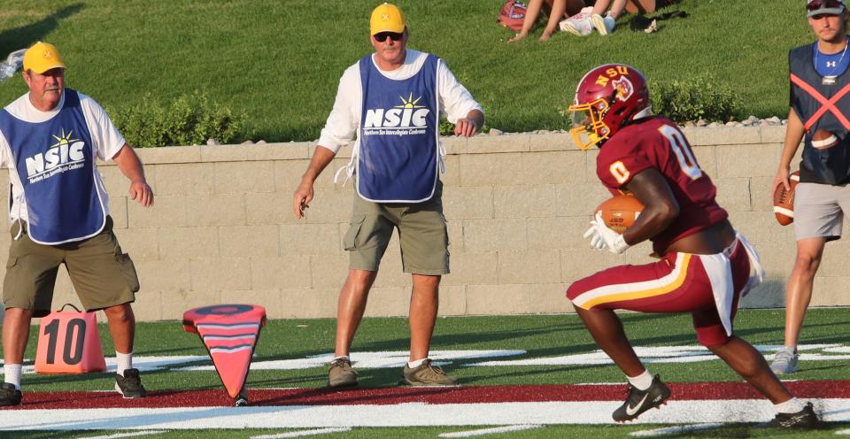 Northern State defensive back Ar'Shon Willis returns an interception he made near the goal line to foil and Upper Iowa drive with about two minutes left before halftime. The Wolves won the season opener 30-0 at Dacotah Bank Stadium.
