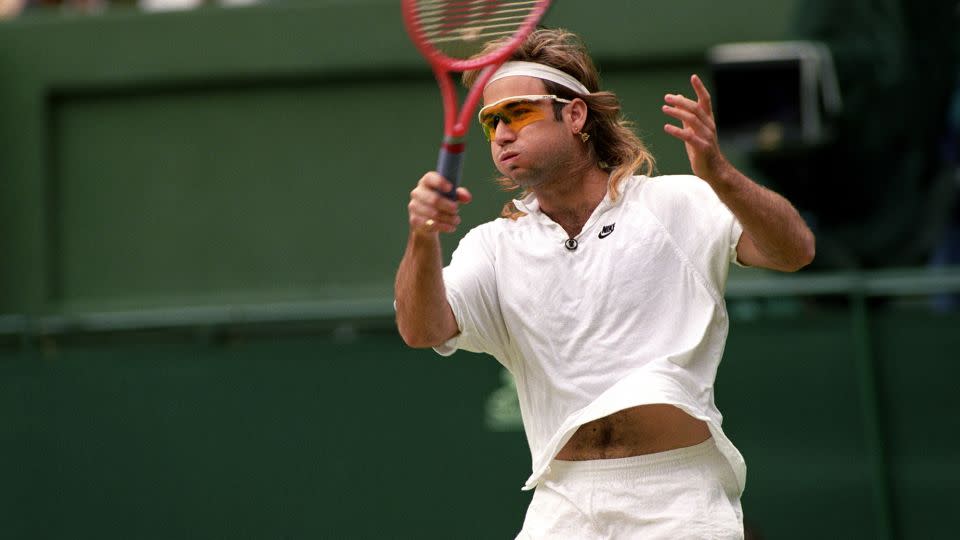 Andre Agassi boycotted Wimbledon from 1988-1990 for its restrictive all-white rule, but showed up in 1991 in orange shades. - Rebecca Naden/PA Images/Getty Images