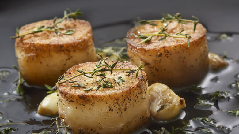 fondant potatoes in frying pan