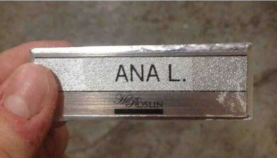 Name badge reading "ANA L." with the last part separated to inadvertently spell an inappropriate word