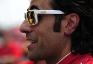 INDIANAPOLIS, IN - MAY 25: Dario Franchitti of Scotland, driver of the #50 Target Chip Ganassi Dallara Honda, wears white sunglasses as a tribute to Dan Wheldon during the pit stop challenge on Carb Day for the Indianapolis 500 on May 25, 2012 at the Indianapolis Motor Speedway in Indianapolis, Indiana. (Photo by Robert Laberge/Getty Images)