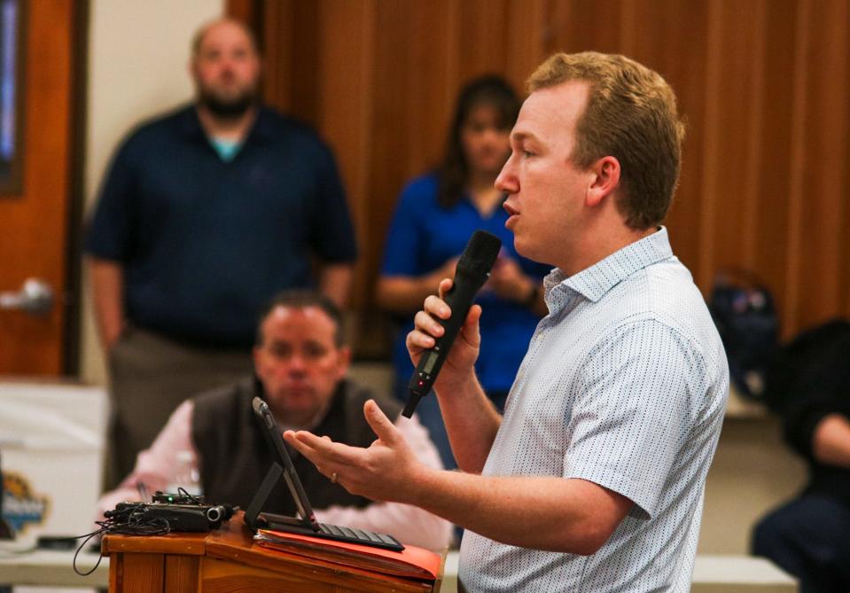 William Nusser, leader of the "Save Our Track" group, speaks at the Nov. 14 Kansas State Fair board meeting after proposals to keep the dirt race tracks were heard by the board.