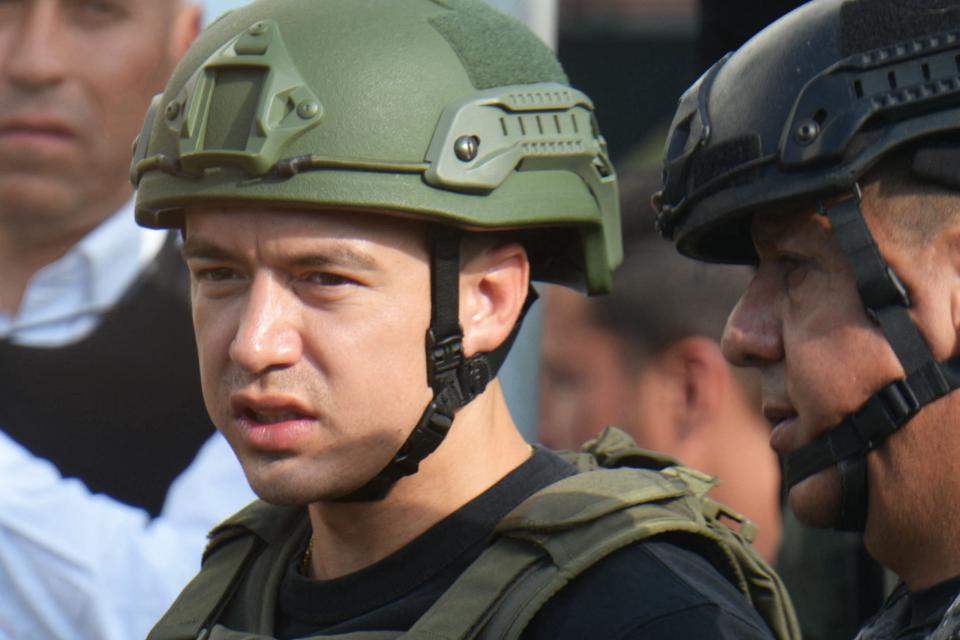 Ecuador's President Daniel Noboa wears a bulletproof vest and a helmet to verify the results of a police and military operation at the Socio Vivienda neighborhood in Guayaquil, Ecuador on March 26, 2024.