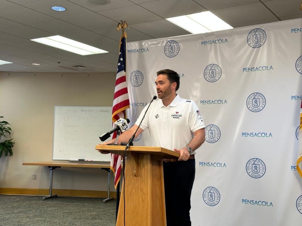 Pensacola Mayor D.C. Reeves wears an American Magic team shirt during a press conference Monday, May 16, 2023.