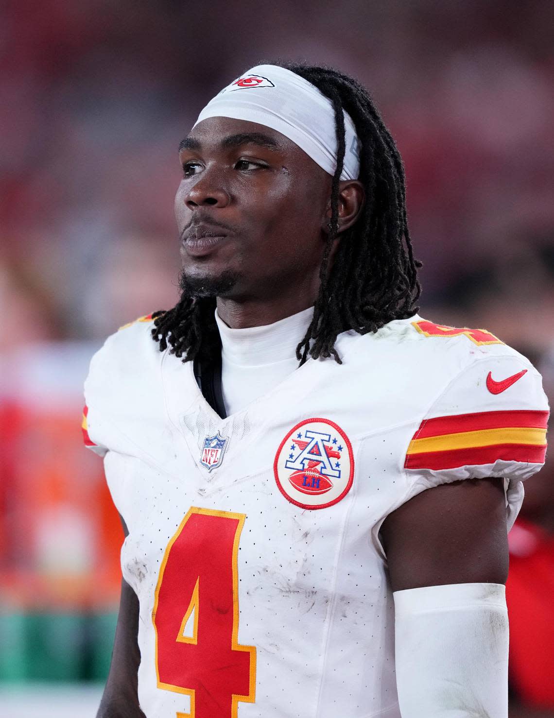 Kansas City Chiefs wide receiver Rashee Rice (4) looks on against the Arizona Cardinals at State Farm Stadium on Aug. 19, 2023, in Glendale, Arizona. He turned himself in to authorities Thursday after a warrant for his arrest was issued Wednesday in a hit-and-run crash in Dallas that injured at least four people.