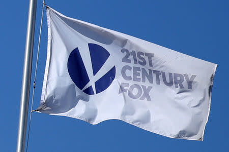 FILE PHOTO: The Twenty-First Century Fox Studios flag flies over the company building in Los Angeles, California U.S. on November 6, 2017. REUTERS/Lucy Nicholson /File Photo