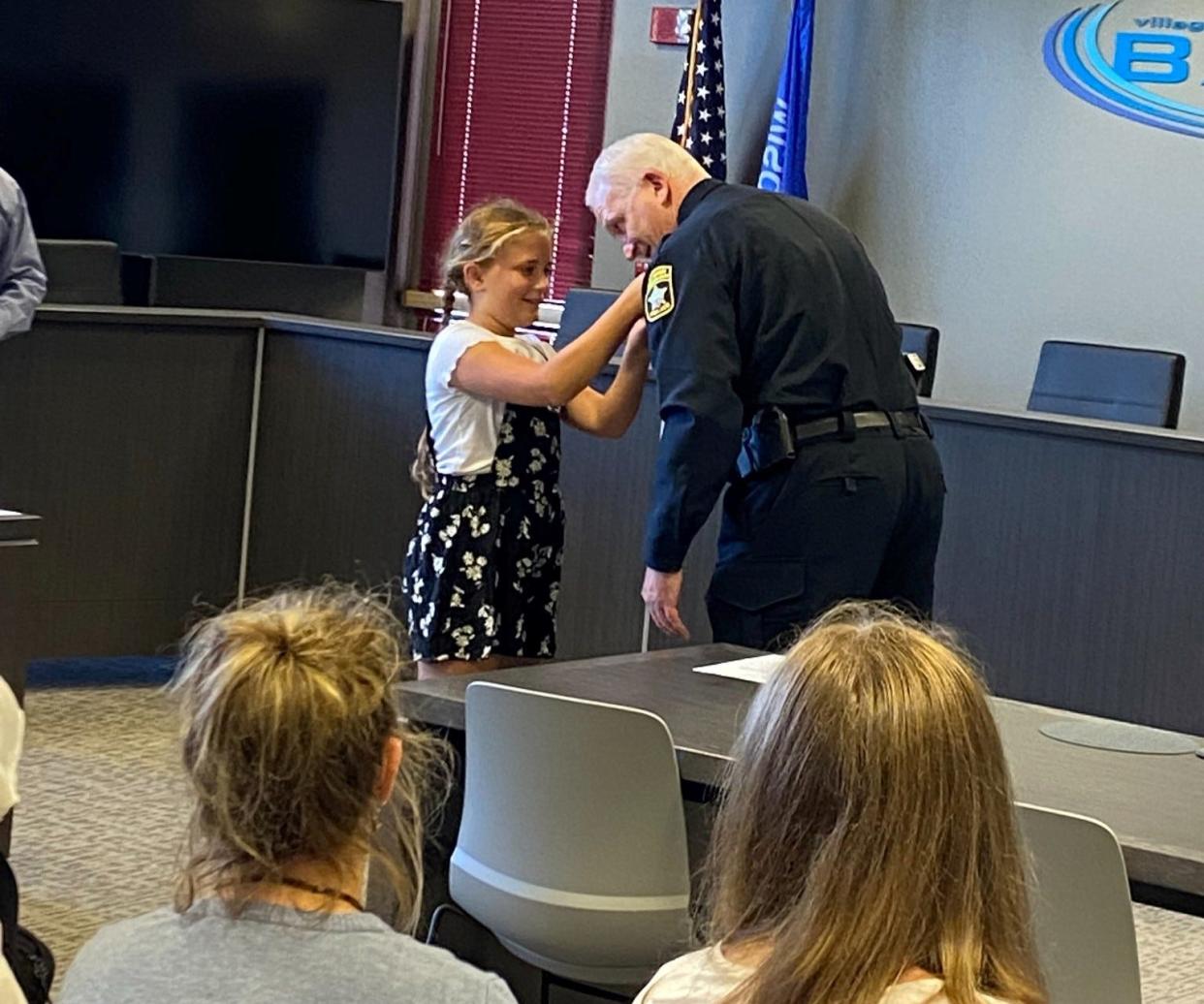Tom Liebenthal is now the police chief for the village of Bayside Police Department. Former Chief Douglas Larsson administered the oath of office, and Liebenthal's daughter Kennedy pinned on his chief badge during the ceremony.