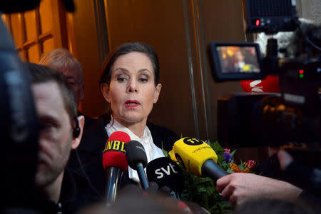 The Swedish Academy's Permanent Secretary Sara Danius talks to the media as she leaves after a meeting at the Swedish Academy in Stockholm, Sweden April 12, 2018. Danius said to journalists that she would leave her position and the Swedish Academy immediately. TT News Agency/Jonas Ekstromer/ via REUTERS