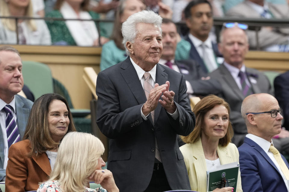 Dustin Hoffman reacts as he watches the third round match between Spain's Carlos Alcaraz and Francis Tiafoe of the United States at the Wimbledon tennis championships in London, Friday, July 5, 2024. (AP Photo/Alberto Pezzali)