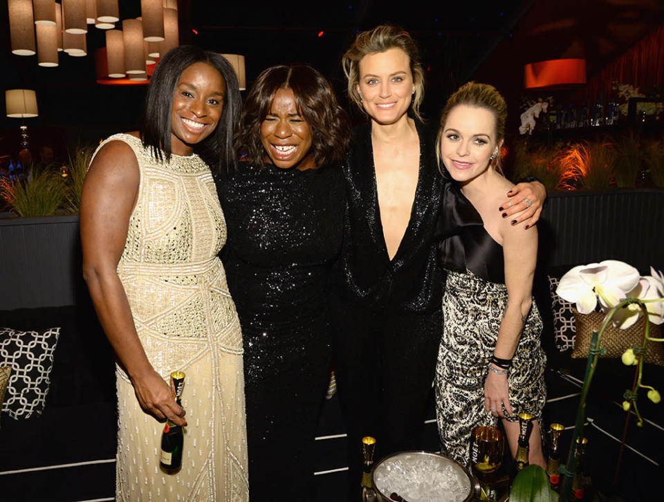 “Orange Is the New Black” stars Uzo Aduba, Taylor Schilling, and Taryn Manning do pretty much everything together, from partying to vacationing. (Photo: Getty Images)