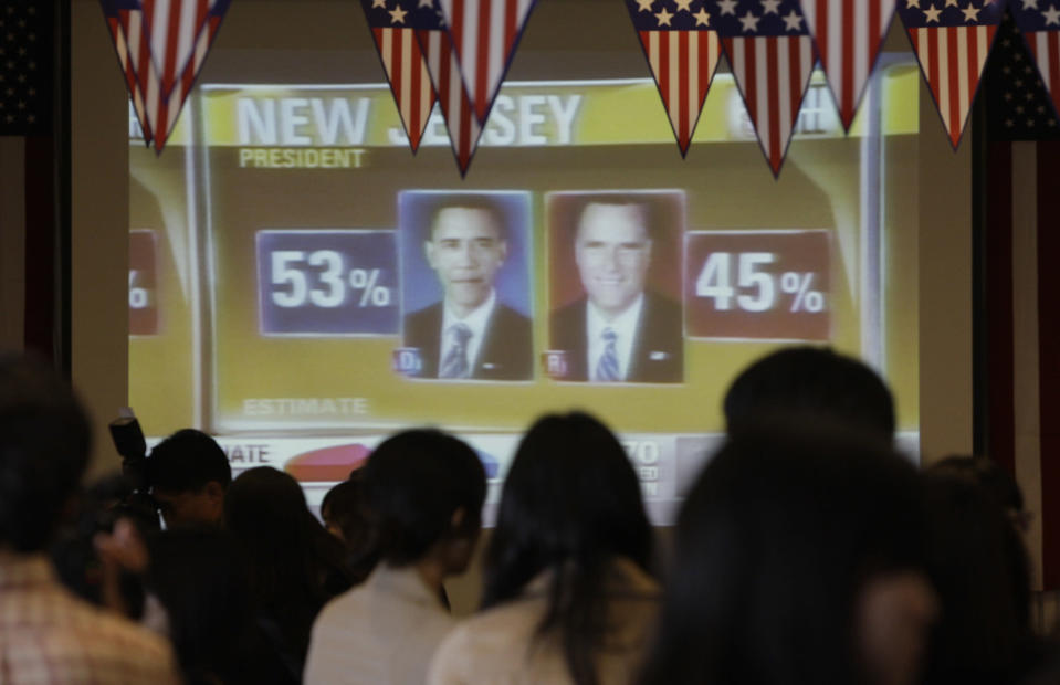 South Koreans watch an election broadcast on television on November 7, 2012 in Seoul, South Korea. (Photo by Chung Sung-Jun/Getty Images)